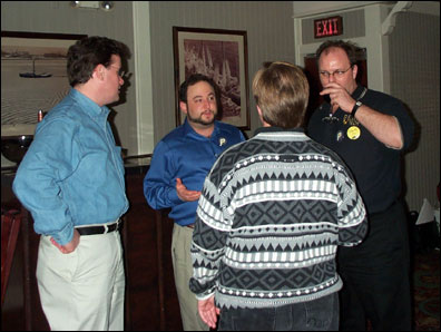 Stephen Walch, Seth Ober, Rocky Oliver (with his back to the camera), and Brian Benz got started early at the Penumbra Group pre-Lotusphere dinner party at Fulton's.