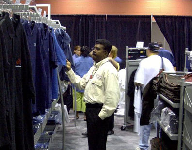 Philip Neelamegam, who is manager of business development for crm4notes.com in Toronto, beat the crowds to the Lotus Store on Sunday to shop for shirts.